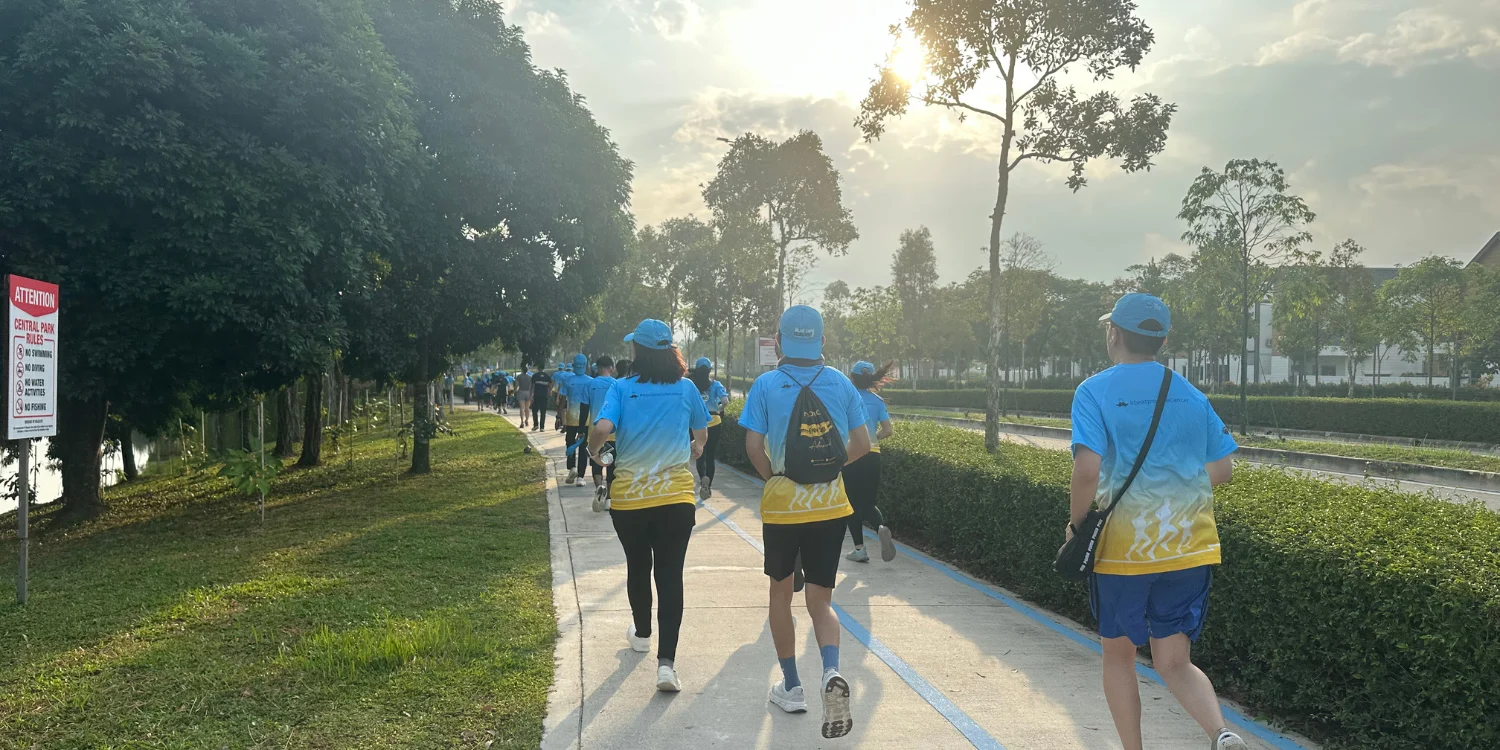 jogging together on a sunny morning during the Blue Cap Run 2025, enjoying a healthy and meaningful activity jogging together on a sunny morning during the Blue Cap Run 2025, enjoying a healthy and meaningful activity