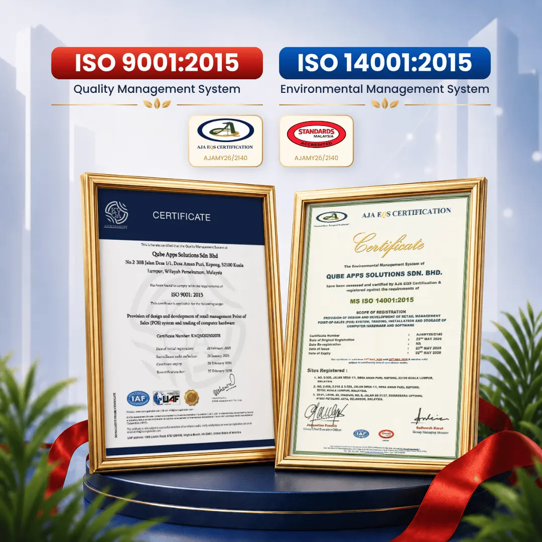 ISO 9001:2015 and ISO 14001:2015 certification display featuring framed certificates awarded to Qube Apps Solutions Sdn. Bhd.