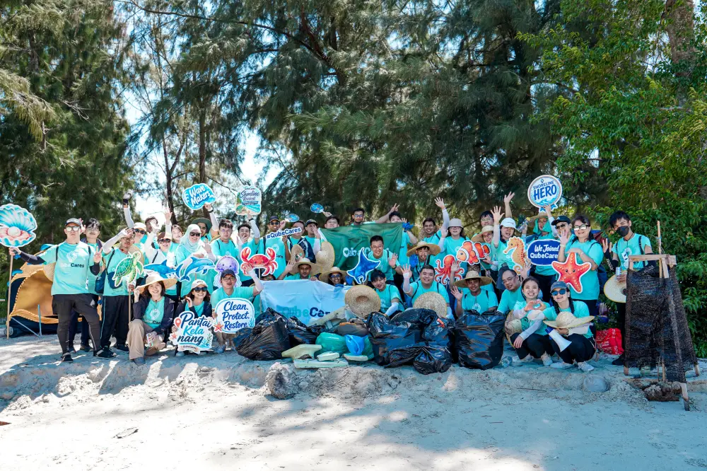 QubeApps employees at Shoreline Revival 2026 in Pantai Kelanang
