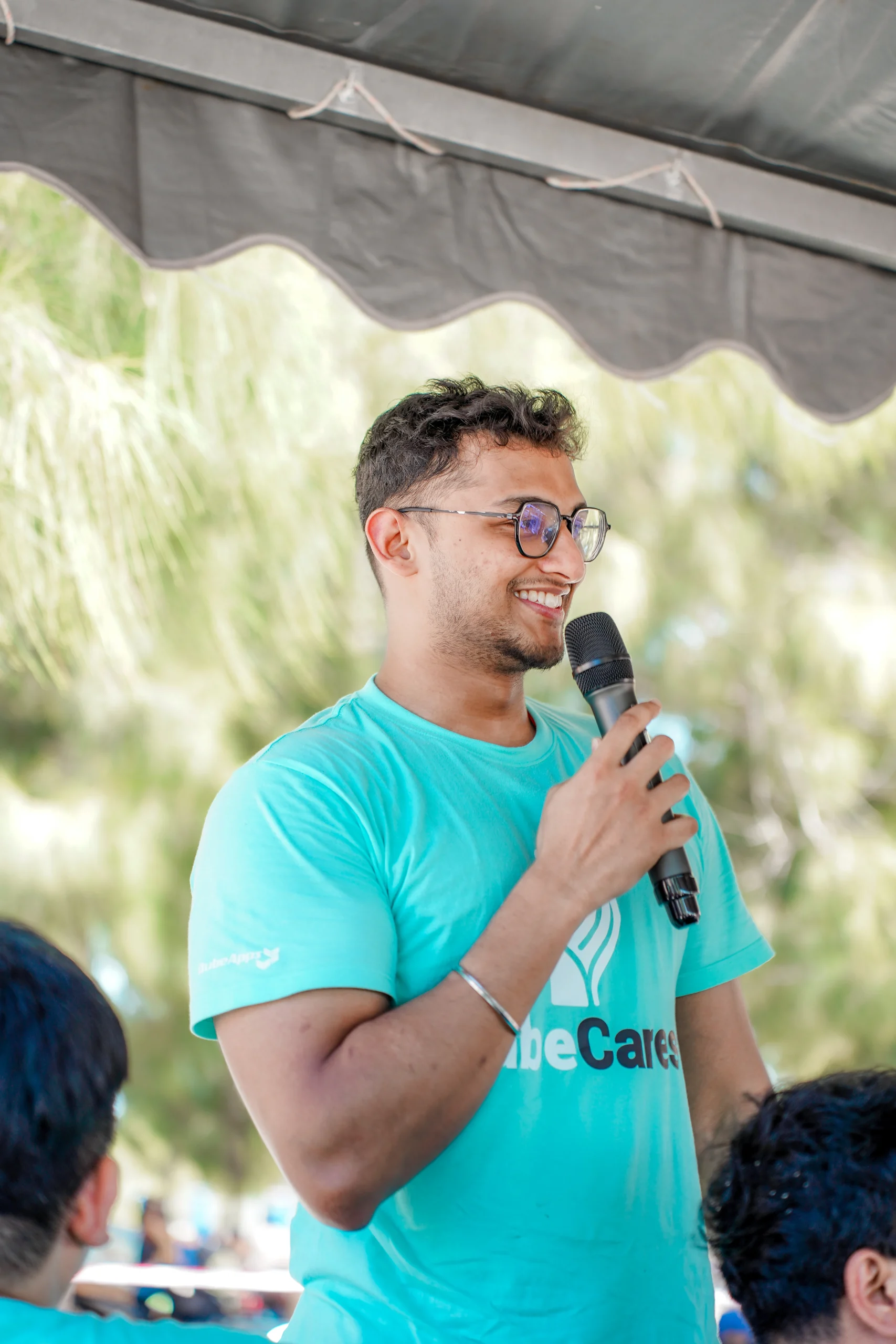 QubeApps volunteer speaking during the post-clean-up reflection session QubeApps volunteer speaking during the post-clean-up reflection session